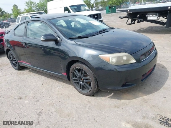 2007 Scion tC Spec with VIN JTKDE177270189720, listed as a IAAI auction lot 42091253 with 123,521 mi miles. Bid and sale history available at carsss.com. Image 1.