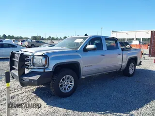 2017 GMC Sierra 1500 SLE with VIN 3GTU2MEC3HG199980, listed as a IAAI auction lot 40534708 with 129,765 mi miles and . Bid and sale history available at DreamBid. Image 17.