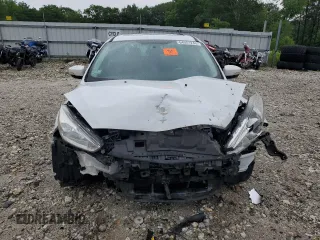 2015 Ford Focus SE with VIN 1FADP3F24FL282695, listed as a Copart auction lot 64051245 with 142,039 mi miles and Clean title. Bid and sale history available at DreamBid. Image 5.