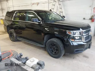 2015 Chevrolet Tahoe Commercial z VIN 1GNSK2EC6FR724871, wystawiony jako IAAI lot #42027104 z przebiegiem 162 306 mil mil oraz . Historia ofert i sprzedaży dostępna na DreamBid. Obrazek 1.