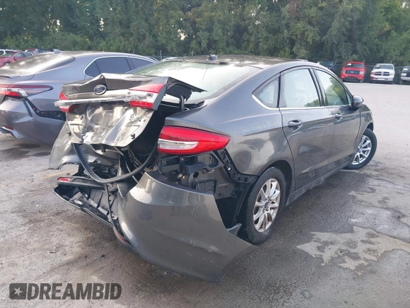 2017 Ford Fusion S with VIN 3FA6P0G76HR121500, listed as a IAAI auction lot 40308024 with 130,325 mi miles. Bid and sale history available at carsss.com. Image 4.