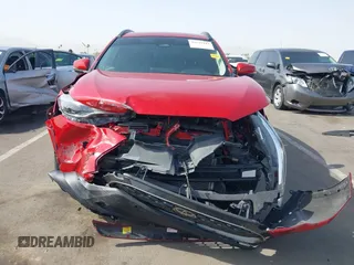 2023 Toyota Corolla Cross XLE z VIN 7MUDAAAG0PV065993, wystawiony jako IAAI lot #42629443 z przebiegiem 16 056 mil mil oraz . Historia ofert i sprzedaży dostępna na DreamBid. Obrazek 6.