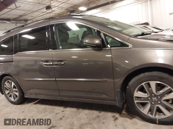 2016 Honda Odyssey Touring Elite with VIN 5FNRL5H92GB045824, listed as a IAAI auction lot 41872220 with 120,557 mi miles. Bid and sale history available at carsss.com. Image 14.