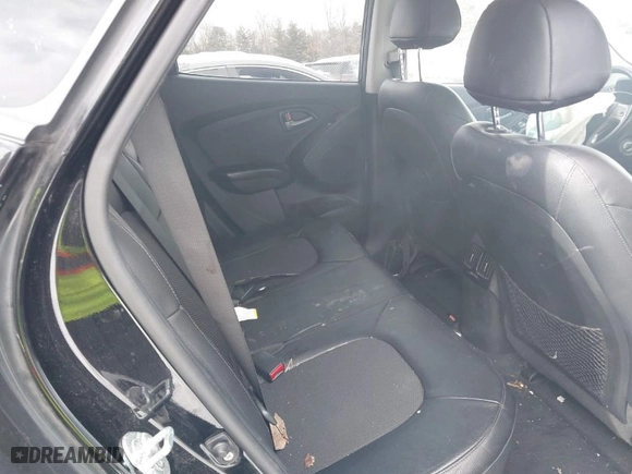 2015 Hyundai Tucson SE with VIN KM8JU3AG2FU103035, listed as a IAAI auction lot 41592256 with 105,792 mi miles. Bid and sale history available at carsss.com. Image 8.