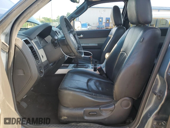 2010 Mercury Mariner Premier with VIN 4M2CN9HG7AKJ07163, listed as a Copart auction lot 62384925 with 113,591 mi miles and Salvage title. Bid and sale history available at DreamBid. Image 7.