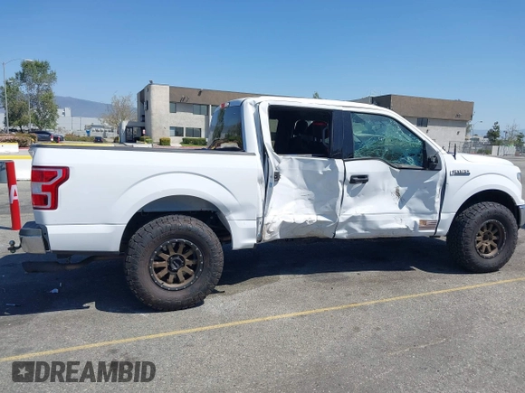 2019 Ford F-150 XL with VIN 1FTEW1C53KKC40961, listed as a IAAI auction lot 41993421 with 63,126 mi miles and . Bid and sale history available at DreamBid. Image 13.