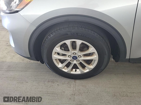 2022 Ford Escape SE z VIN 1FMCU0G67NUB33197, wystawiony jako IAAI lot #42846802 z przebiegiem 39 336 mil mil oraz . Historia ofert i sprzedaży dostępna na DreamBid. Obrazek 7.