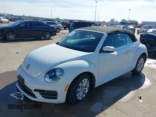2019 Volkswagen Beetle S with VIN 3VW5DAAT0KM507437, listed as a IAAI auction lot 41380821 with 28,010 mi miles and . Bid and sale history available at DreamBid. Image 19.
