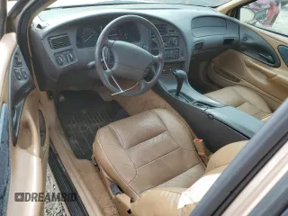 1996 Mercury Cougar z VIN 1MELM62W3TH600523, wystawiony jako Copart lot #78253454 z przebiegiem 84 531 mil mil oraz Tytuł czysty. Historia ofert i sprzedaży dostępna na DreamBid. Obrazek 8.