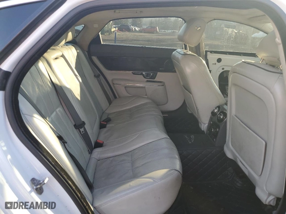 2014 Jaguar XJ with VIN SAJWJ2GD2E8V61998, listed as a Copart auction lot 42962645 with 101,609 mi miles and Salvage Title. Bid and sale history available at carsss.com. Image 10.