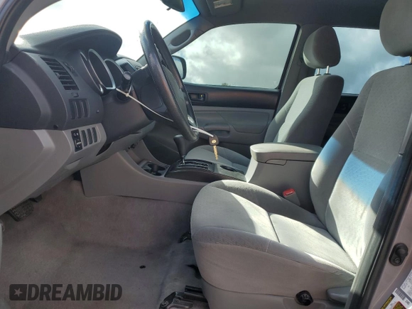 2008 Toyota Tacoma PreRunner with VIN 3TMKU72N28M017714, listed as a Copart auction lot 56787395 with 209,832 mi miles and Salvage title. Bid and sale history available at DreamBid. Image 7.