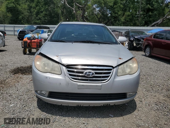 2010 Hyundai Elantra GLS with VIN KMHDU4AD4AU050694, listed as a Copart auction lot 57463205 with 125,228 mi miles and Salvage title. Bid and sale history available at DreamBid. Image 5.