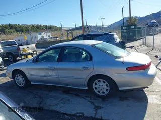 1999 Mercury Sable GS with VIN 1MEFM50U1XA612306, listed as a IAAI auction lot 41745776 with 111,311 mi miles. Bid and sale history available at carsss.com. Image 14.