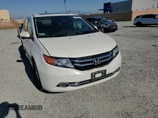 2016 Honda Odyssey Touring Elite with VIN 5FNRL5H9XGB006981, listed as a Copart auction lot 63970385 with 165,164 mi miles and Salvage title. Bid and sale history available at DreamBid. Image 14.