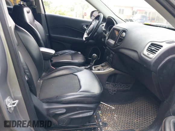 2018 Jeep Compass Latitude with VIN 3C4NJDBB8JT434339, listed as a IAAI auction lot 42404248 with 131,295 mi miles and . Bid and sale history available at DreamBid. Image 5.