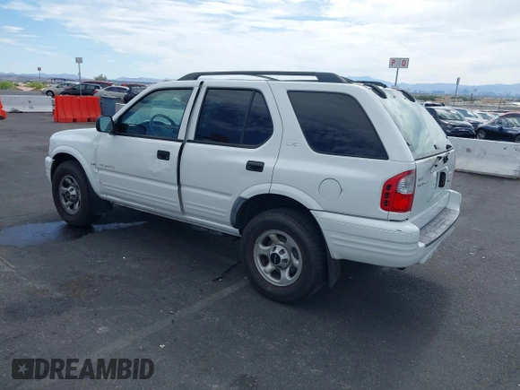 2001 Isuzu Rodeo S with VIN 4S2CK58W614329085, listed as a IAAI auction lot 42303013 with 171,933 mi miles and . Bid and sale history available at DreamBid. Image 3.