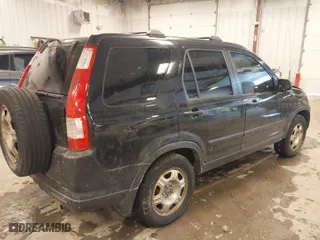 2005 Honda CR-V LX with VIN JHLRD78525C051447, listed as a IAAI auction lot 41554653 with 162,706 mi miles. Bid and sale history available at carsss.com. Image 4.