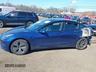 2023 Tesla Model 3 with VIN 5YJ3E1EA2PF690335, listed as a IAAI auction lot 41732701 with 22,238 mi miles and . Bid and sale history available at DreamBid. Image 14.