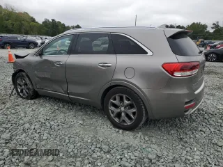 2016 Kia Sorento SXL with VIN 5XYPK4A14GG059158, listed as a Copart auction lot 72459954 with 264,218 mi miles and Salvage Title. Bid and sale history available at carsss.com. Image 2.
