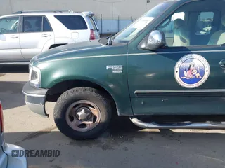 2002 Ford F-150 XL with VIN 1FTRX17L42NA52360, listed as a IAAI auction lot 41886697 with 121,346 mi miles. Bid and sale history available at carsss.com. Image 16.