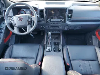 2023 Nissan Frontier Pro-4X with VIN 1N6ED1EK5PN641391, listed as a Copart auction lot 46895485 with 17,465 mi miles and Salvage title. Bid and sale history available at DreamBid. Image 8.