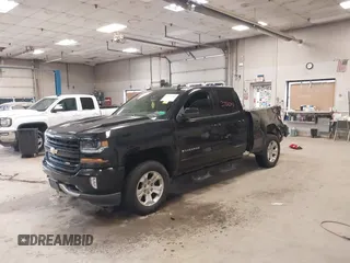2017 Chevrolet Silverado 1500 LT with VIN 1GCVKREC0HZ384747, listed as a IAAI auction lot 37311343 with 67,390 mi miles. Bid and sale history available at carsss.com. Image 2.