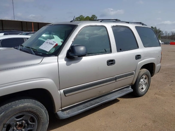 2005 Chevrolet Tahoe LS with VIN 1GNEC13V85R240613, listed as a IAAI auction lot 41676860 with 242,846 mi miles. Bid and sale history available at carsss.com. Image 6.
