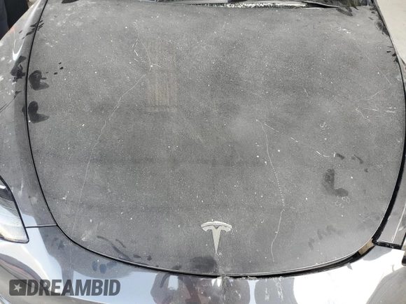2024 Tesla Model Y с VIN 7SAYGDED3RF044335, выставлен на аукционе Copart как лот 58263265 с пробегом Не указан миль и Списание • Salvage title. История ставок и продаж доступна на DreamBid. Изображение 11.