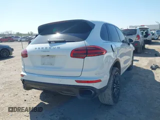 2016 Porsche Cayenne with VIN WP1AA2A29GLA04374, listed as a IAAI auction lot 41988374 with 144,716 mi miles. Bid and sale history available at carsss.com. Image 4.