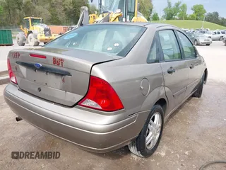 2003 Ford Focus SE with VIN 1FAFP34PX3W123696, listed as a IAAI auction lot 42065510 with 159,842 mi miles and . Bid and sale history available at carsss.com. Image 4.