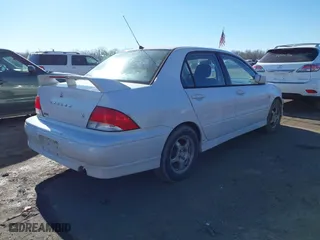 2003 Mitsubishi Lancer OZ-Rally with VIN JA3AJ86E13U100350, listed as a IAAI auction lot 41584874 with 244,945 mi miles. Bid and sale history available at carsss.com. Image 4.