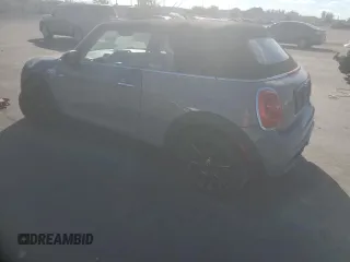 2017 MINI Convertible Cooper S z VIN WMWWG9C34H3C81536, wystawiony jako Copart lot #81806704 z przebiegiem 60 800 mil mil oraz Czysty tytuł • Clean title. Historia ofert i sprzedaży dostępna na DreamBid. Obrazek 2.