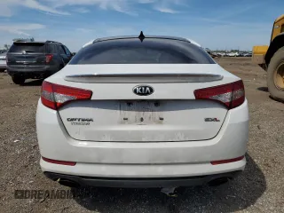 2013 Kia Optima SX z VIN 5XXGR4A61DG152999, wystawiony jako Copart lot #55852445 z przebiegiem 124 825 mil mil oraz Szkoda całkowita • Salvage title. Historia ofert i sprzedaży dostępna na DreamBid. Obrazek 6.