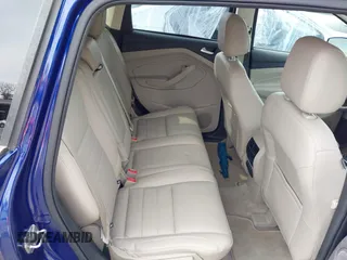 2016 Ford Escape Titanium with VIN 1FMCU9JXXGUA71898, listed as a IAAI auction lot 41758284 with 51,935 mi miles. Bid and sale history available at carsss.com. Image 8.