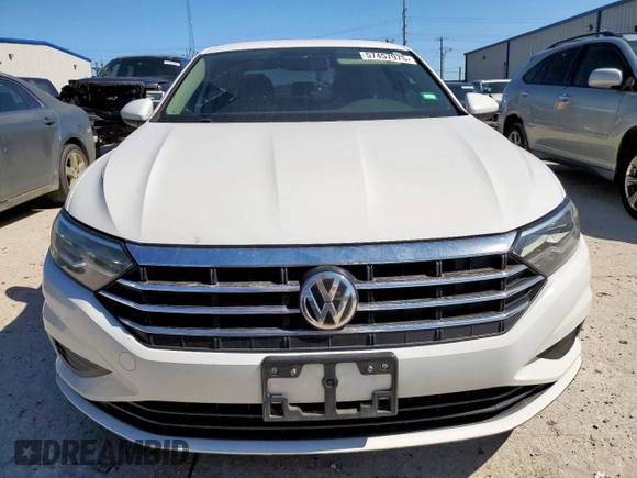 2019 Volkswagen Jetta S with VIN 3VWC57BU7KM064315, listed as a Copart auction lot 57457975 with 129,596 mi miles and Salvage title. Bid and sale history available at DreamBid. Image 5.