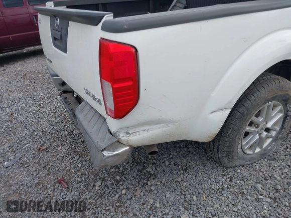 2014 Nissan Frontier SV with VIN 1N6AD0EV2EN718895, listed as a IAAI auction lot 40332972 with 53,391 mi miles and . Bid and sale history available at DreamBid. Image 6.