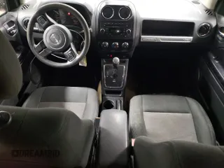 2016 Jeep Compass Sport with VIN 1C4NJDBB6GD686282, listed as a Copart auction lot 48011795 with 128,085 mi miles and Salvage Title. Bid and sale history available at carsss.com. Image 8.