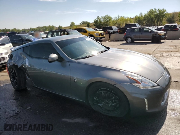 2015 Nissan 370Z with VIN JN1AZ4EH2FM444159, listed as a Copart auction lot 71005944 with 54,063 mi miles and Salvage Title. Bid and sale history available at carsss.com. Image 4.