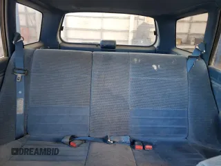 1994 Ford Escort z VIN 3FARP15J6RR126053, wystawiony jako Copart lot #52750515 z przebiegiem 81 831 mil mil oraz Tytuł czysty. Historia ofert i sprzedaży dostępna na DreamBid. Obrazek 10.