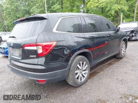 2022 Honda Pilot EX-L with VIN 5FNYF6H58NB018372, listed as a IAAI auction lot 42327580 with 79,332 mi miles and . Bid and sale history available at DreamBid. Image 4.