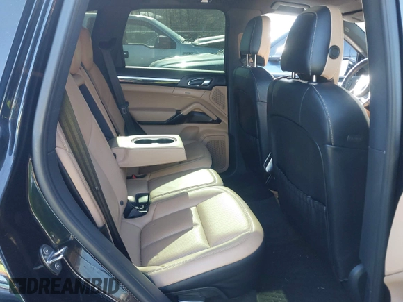 2016 Porsche Cayenne with VIN WP1AA2A28GKA37162, listed as a IAAI auction lot 41424921 with 95,717 mi miles. Bid and sale history available at carsss.com. Image 8.