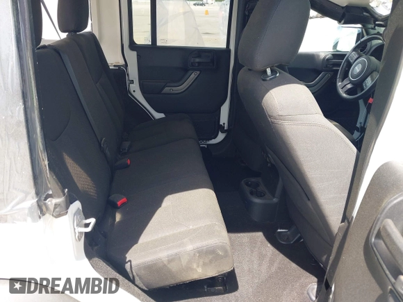 2018 Jeep Wrangler Unlimited Sport S with VIN 1C4BJWDG3JL810853, listed as a IAAI auction lot 42074032 with 141,942 mi miles and . Bid and sale history available at DreamBid. Image 8.
