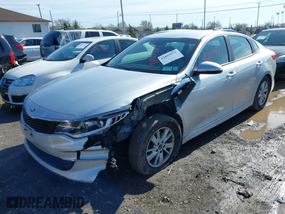 2016 Kia Optima LX with VIN 5XXGT4L34GG078857, listed as a IAAI auction lot 41819971 with 112,963 mi miles. Bid and sale history available at carsss.com. Image 18.
