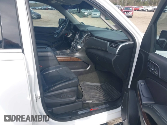 2017 Chevrolet Tahoe LT with VIN 1GNSKBKCXHR350028, listed as a IAAI auction lot 41684954 with 117,261 mi miles and . Bid and sale history available at DreamBid. Image 5.