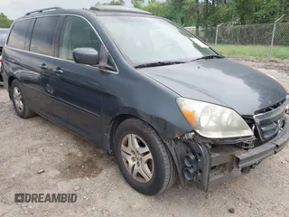 2006 Honda Odyssey EX-L z VIN 5FNRL38756B420817, wystawiony jako IAAI lot #42101271 z przebiegiem 203 892 mil mil oraz . Historia ofert i sprzedaży dostępna na DreamBid. Obrazek 1.