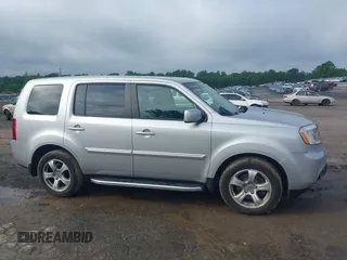 2015 Honda Pilot EX-L with VIN 5FNYF4H5XFB014653, listed as a IAAI auction lot 42121003 with 152,912 mi miles and . Bid and sale history available at carsss.com. Image 14.