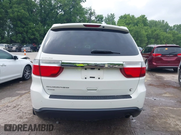 2012 Dodge Durango SXT with VIN 1C4RDJAG8CC336267, listed as a IAAI auction lot 42377138 with 179,555 mi miles and . Bid and sale history available at DreamBid. Image 16.