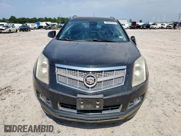 2012 Cadillac SRX Premium Collection z VIN 3GYFNCE39CS526425, wystawiony jako Copart lot #60557615 z przebiegiem 161 217 mil mil oraz Szkoda całkowita • Salvage title. Historia ofert i sprzedaży dostępna na DreamBid. Obrazek 5.