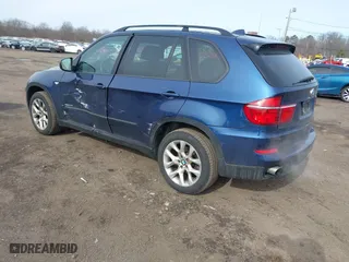2011 BMW X5 35i with VIN 5UXZV4C56BL412415, listed as a IAAI auction lot 41611847 with 141,848 mi miles. Bid and sale history available at carsss.com. Image 3.