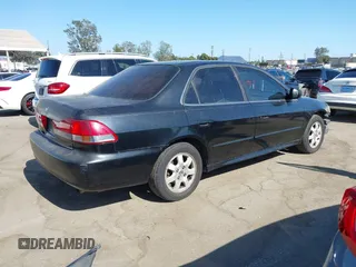2001 Honda Accord EX z VIN JHMCG66861C018784, wystawiony jako IAAI lot #42405898 z przebiegiem 260 816 mil mil oraz . Historia ofert i sprzedaży dostępna na DreamBid. Obrazek 4.